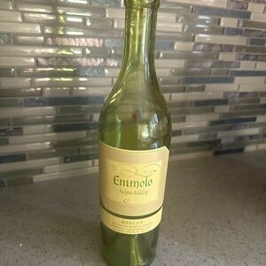 Empty Emmolo wine bottle